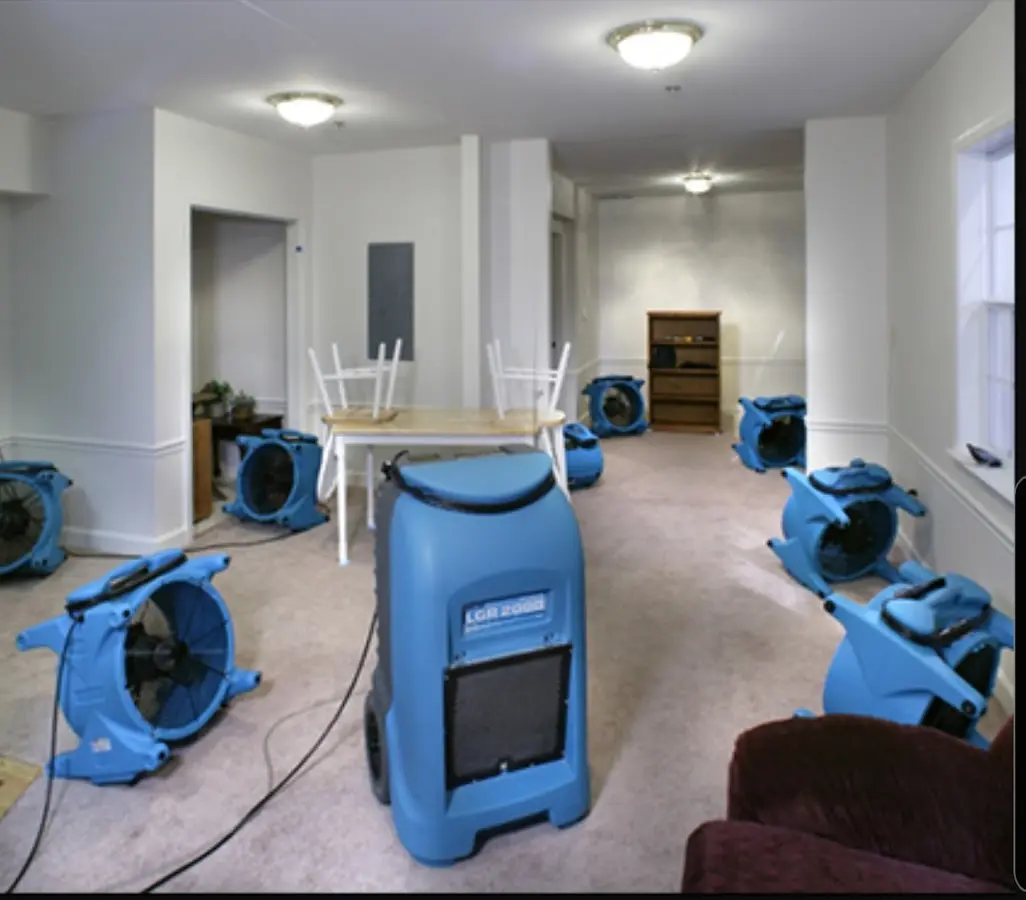 Air movers and dehumidifier setup for Water Extraction & Removal in Timberlake